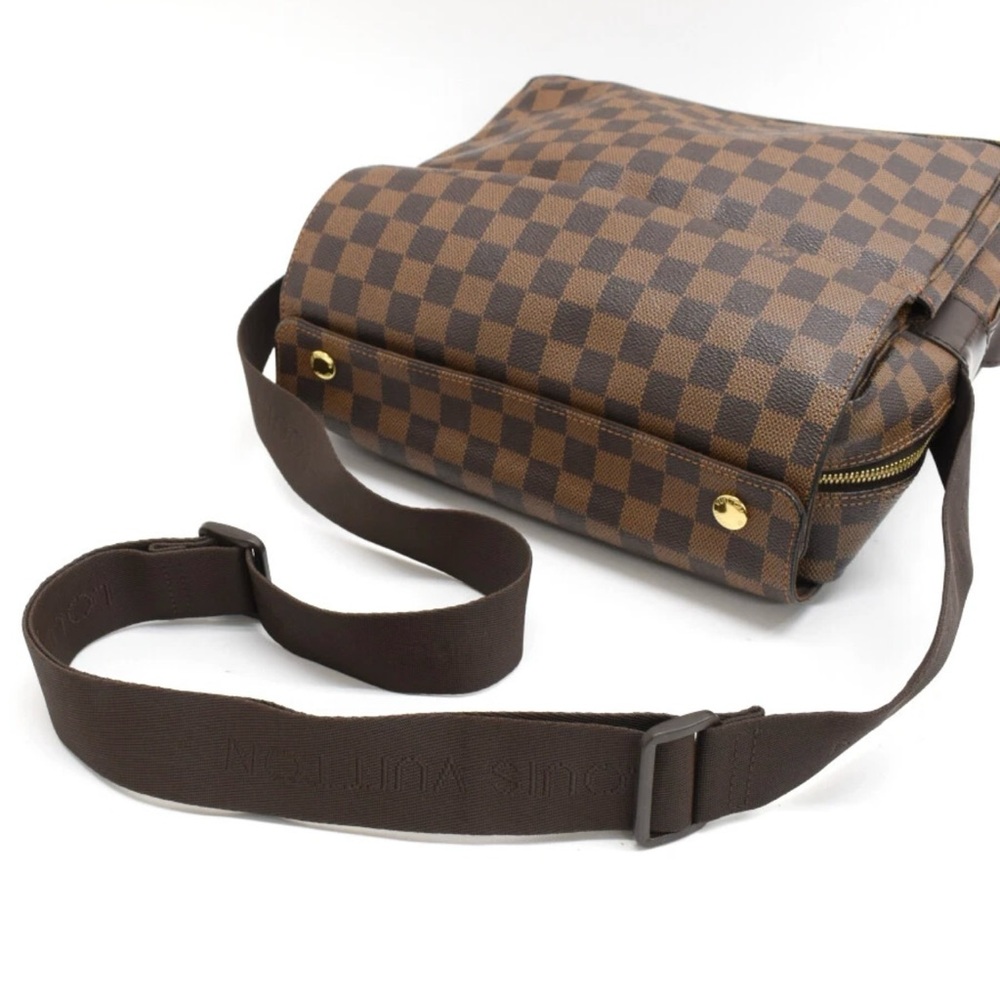 Louis Vuitton leather messenger bag.
